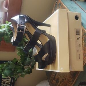 Black open toed leather pumps